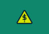 Dollar sign in a triangle.